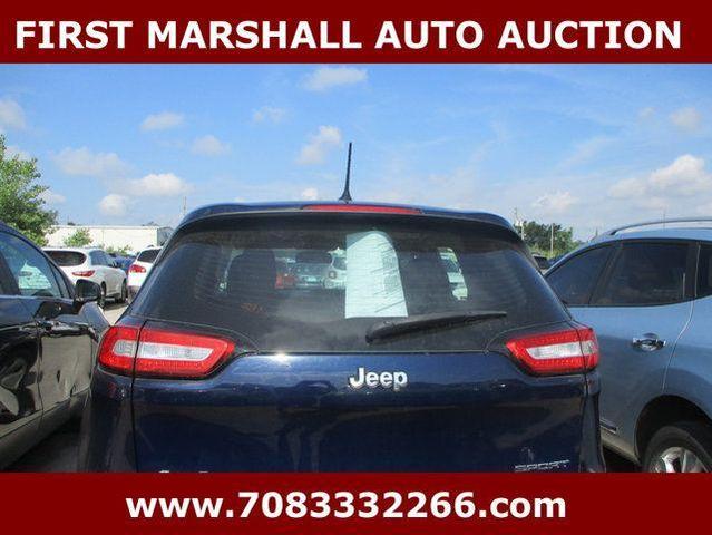 Photo of 2014 Blue Jeep Cherokee