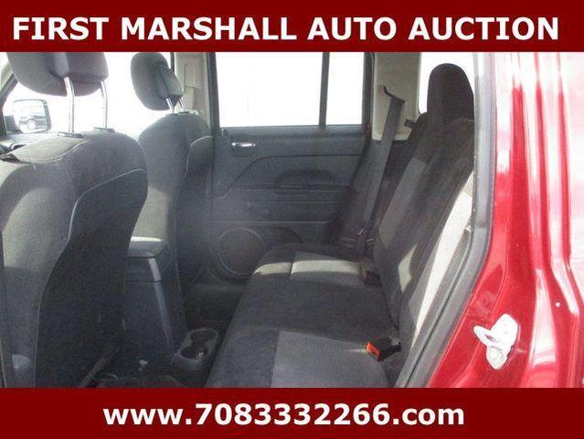 Photo of 2016 Deep Cherry Red Crystal Pearlcoat Jeep Patriot