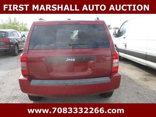 Photo of 2016 Deep Cherry Red Crystal Pearlcoat Jeep Patriot