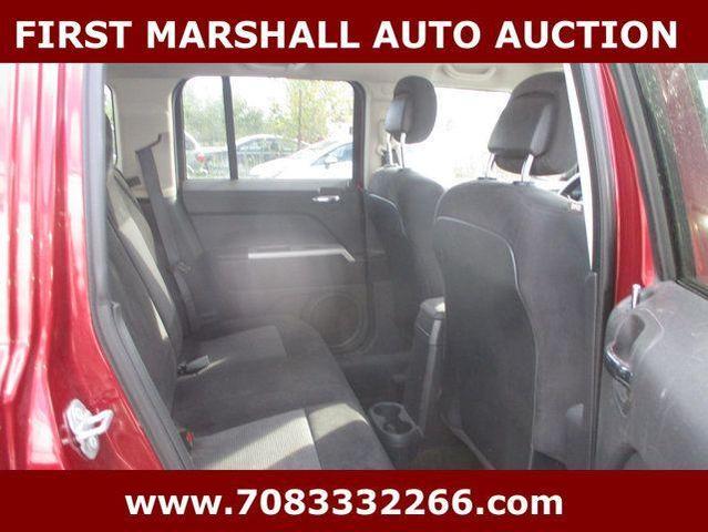 Photo of 2016 Deep Cherry Red Crystal Pearlcoat Jeep Patriot