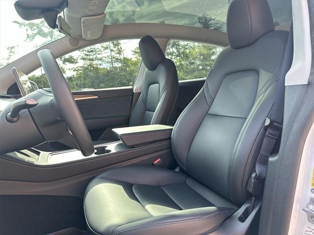 Photo of 2024 Pearl White Multi-Coat Tesla Model Y