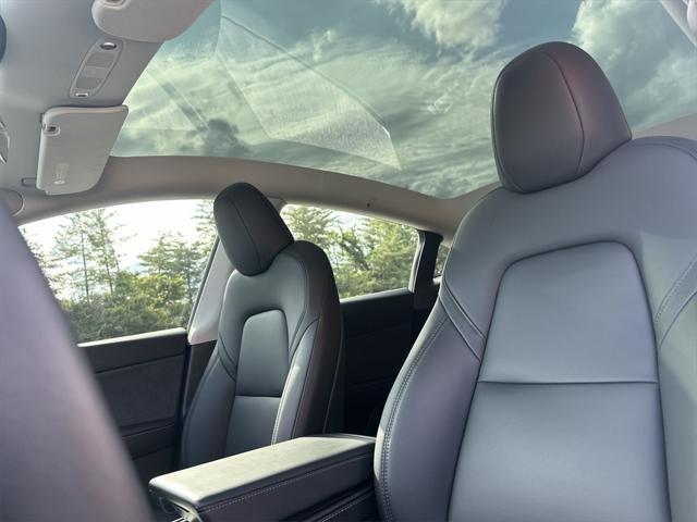 Photo of 2024 Pearl White Multi-Coat Tesla Model Y