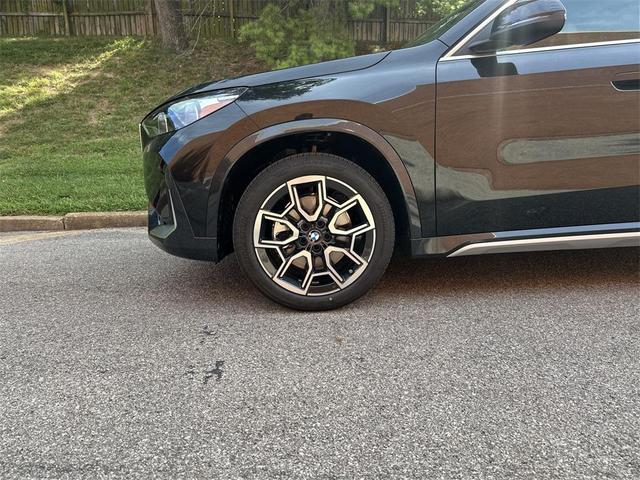 Photo of 2026 Black Sapphire Metallic BMW X1