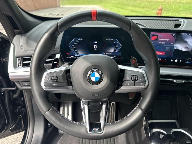 Photo of 2024 Black Sapphire Metallic BMW X1