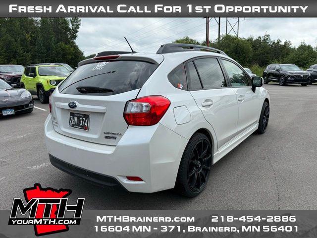 Photo of 2014 Satin White Pearl Subaru Impreza