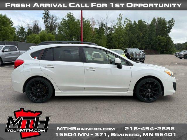 Photo of 2014 Satin White Pearl Subaru Impreza