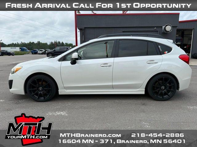 Photo of 2014 Satin White Pearl Subaru Impreza