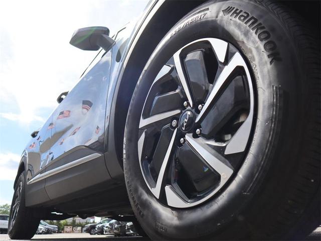 Photo of 2024 Gravity Gray Kia Sportage Hybrid