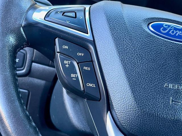 Photo of 2015 Ingot Silver Metallic Ford Edge