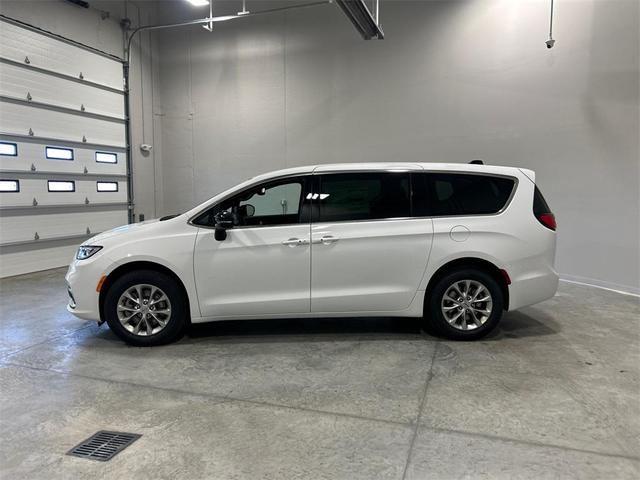 Photo of 2025 Bright White Clearcoat Chrysler Pacifica