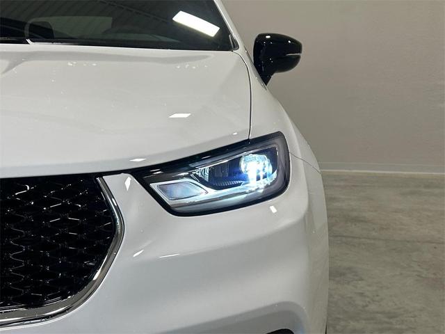 Photo of 2025 Bright White Clearcoat Chrysler Pacifica