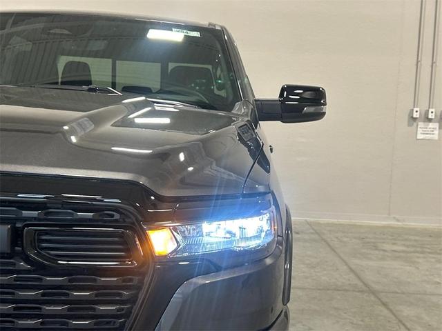 Photo of 2025 Granite Crystal Clearcoat Metallic RAM 1500