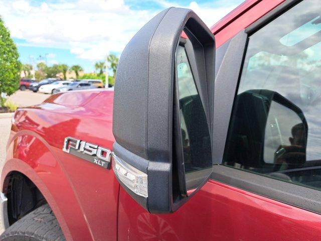 Photo of 2015 Ruby Red Metallic Tinted Clearcoat Ford F-150