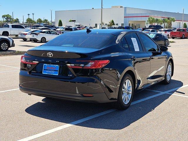 Photo of 2025 Midnight Black Metallic Toyota Camry