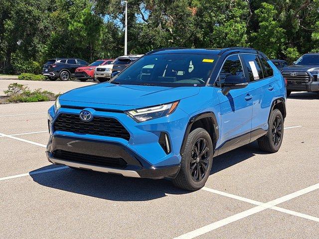 Photo of 2022 Cavalry Blue/Midnight Black Metallic Toyota RAV4 Hybrid