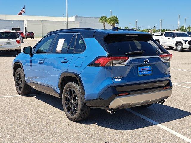 Photo of 2022 Cavalry Blue/Midnight Black Metallic Toyota RAV4 Hybrid