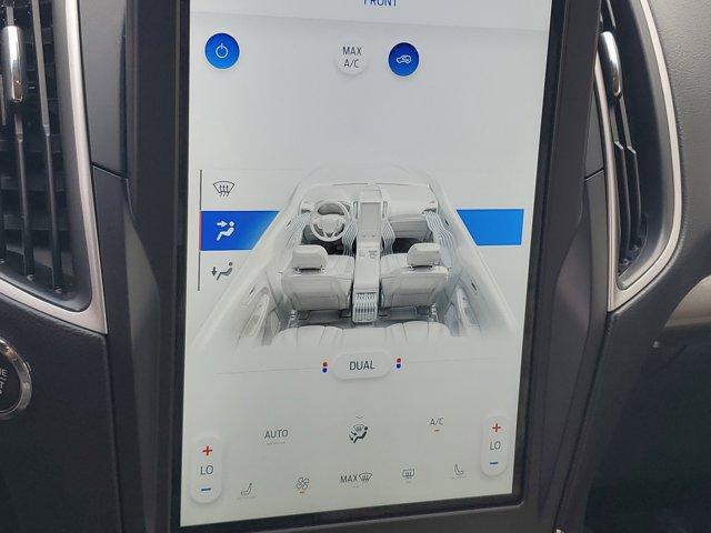 Photo of 2024 Black Metallic Ford Edge