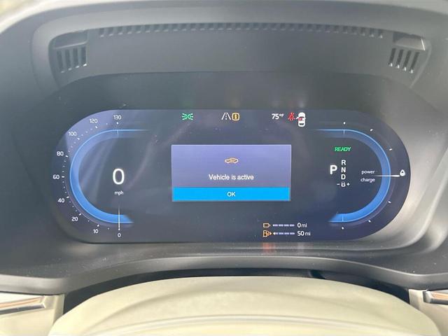 Photo of 2025 Crystal White Metallic Volvo XC60 Plug-In Hybrid