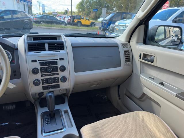 Photo of 2010 Off White Ford Escape