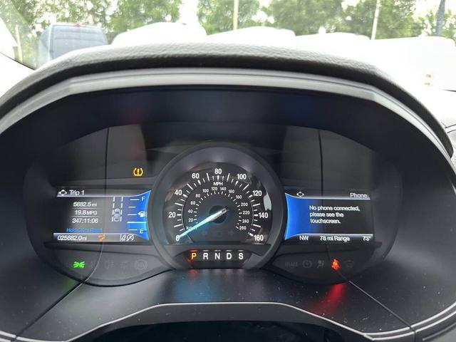 Photo of 2024 Agate Black Metallic Ford Edge