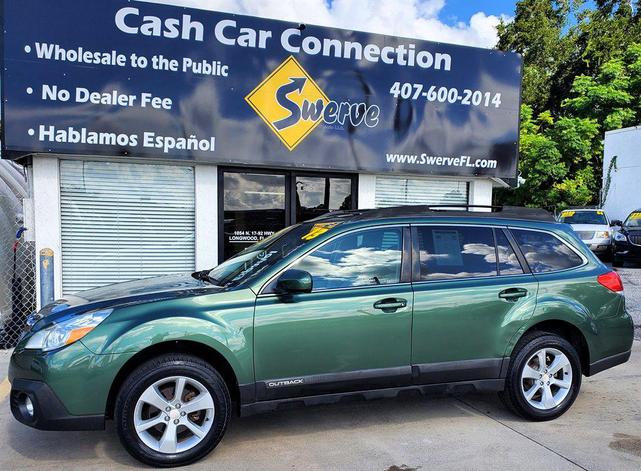 Photo of 2013 Green Subaru Outback