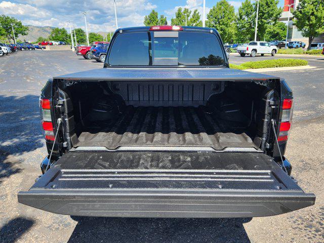 Photo of 2024 Super Black Nissan Frontier