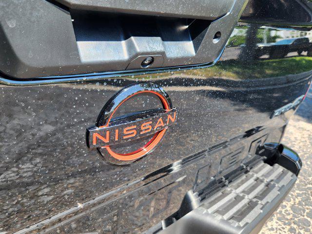 Photo of 2024 Super Black Nissan Frontier