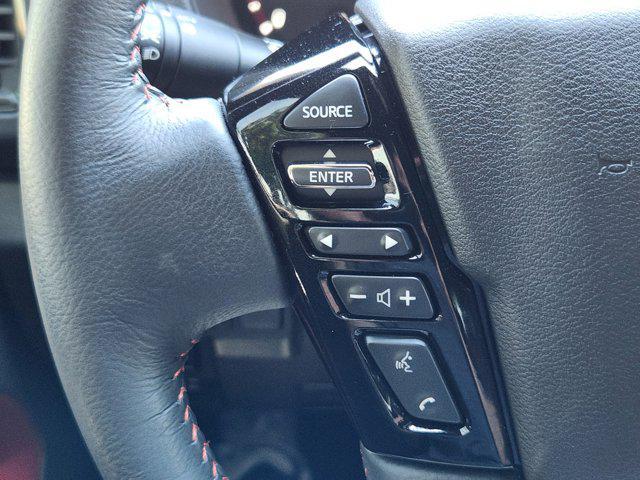 Photo of 2024 Super Black Nissan Frontier