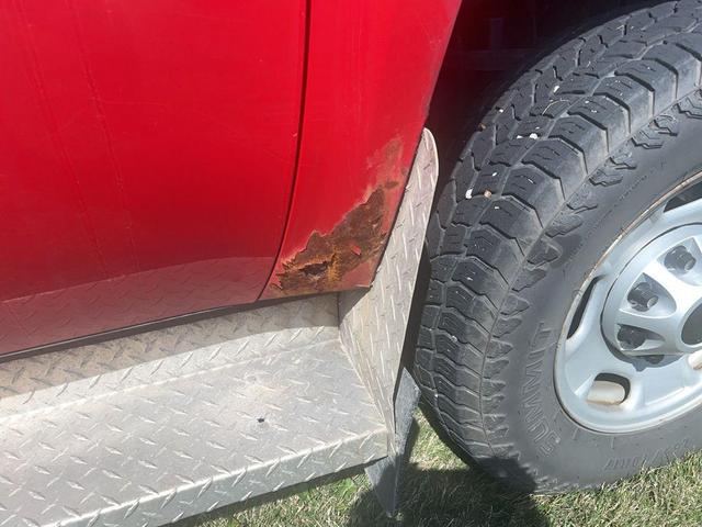 Photo of 2013 Fire Red GMC Sierra 2500