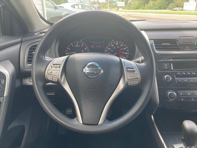 Photo of 2014 Black Metallic Nissan Altima