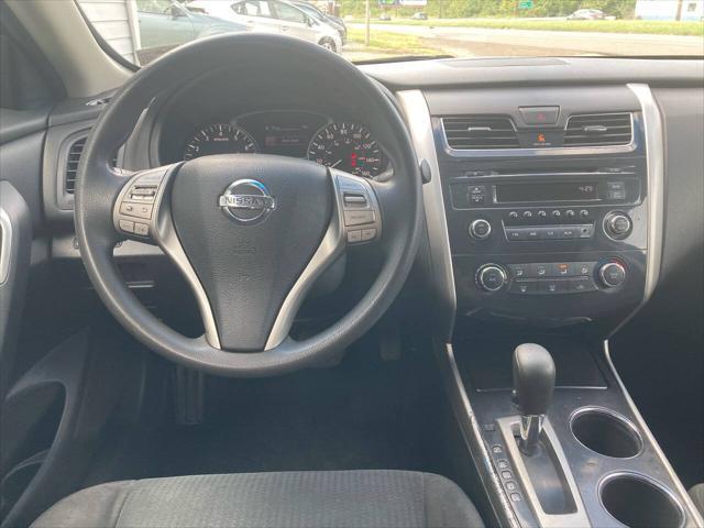 Photo of 2014 Black Metallic Nissan Altima