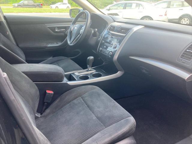 Photo of 2014 Black Metallic Nissan Altima