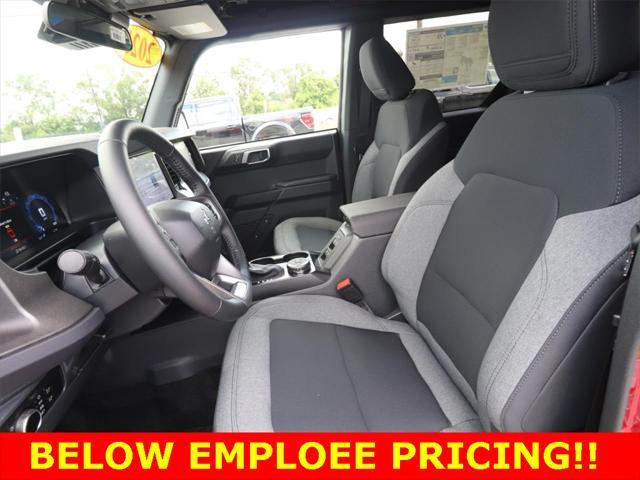 Photo of 2025 Ruby Red Metallic Tinted Clearcoat Ford Bronco