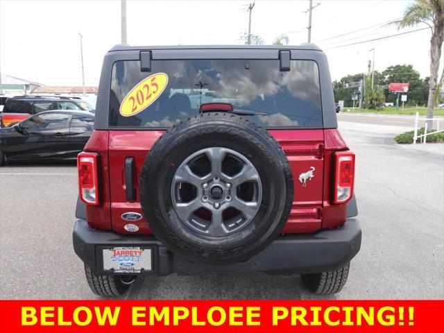 Photo of 2025 Ruby Red Metallic Tinted Clearcoat Ford Bronco