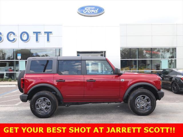 Photo of 2025 Ruby Red Metallic Tinted Clearcoat Ford Bronco