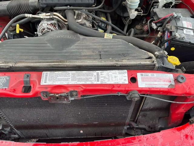 Photo of 2000 Red Dodge Ram 1500