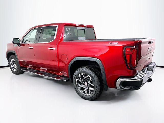 Photo of 2026 Volcanic Red Tintcoat GMC Sierra 1500