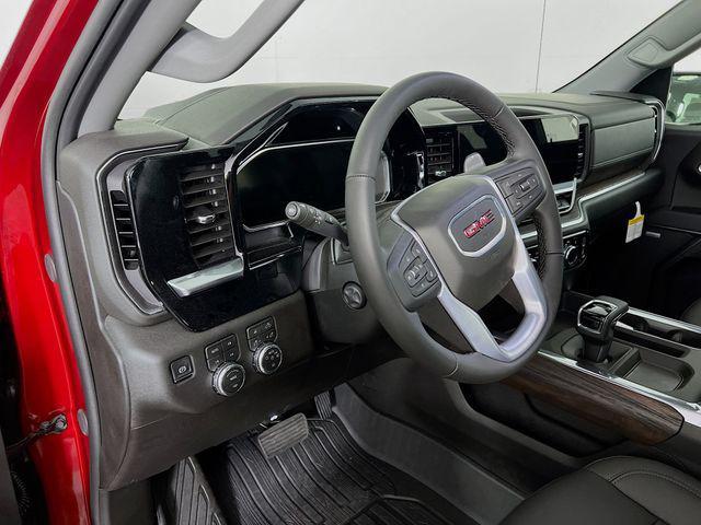 Photo of 2026 Volcanic Red Tintcoat GMC Sierra 1500