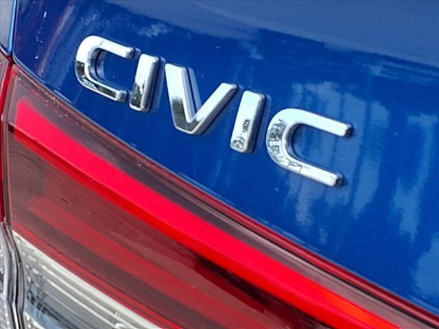Photo of 2023 Boost Blue Pearl Honda Civic