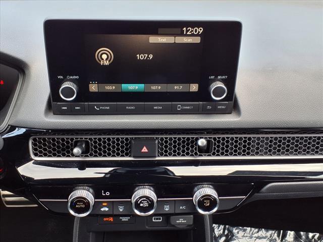 Photo of 2023 Boost Blue Pearl Honda Civic