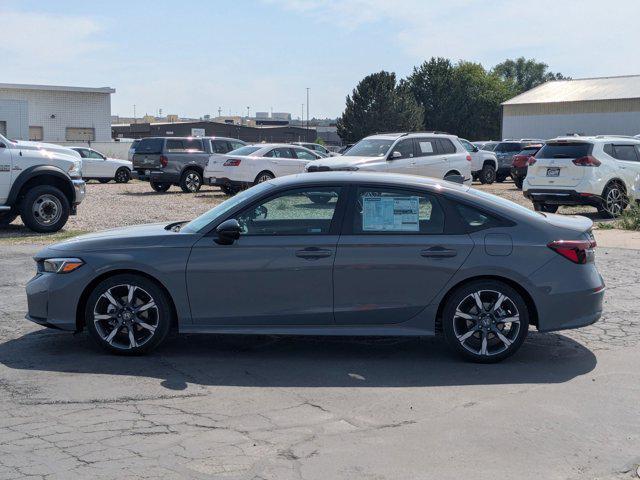 Photo of 2026 Urban Gray Pearl Honda Civic Hybrid