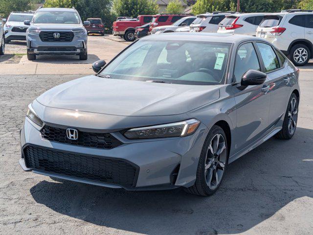Photo of 2026 Urban Gray Pearl Honda Civic Hybrid