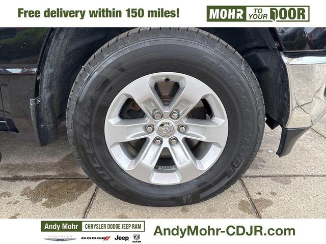 Photo of 2023 Diamond Black Crystal Pearlcoat RAM 1500