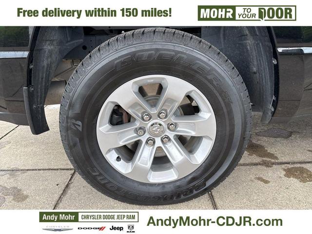 Photo of 2023 Diamond Black Crystal Pearlcoat RAM 1500