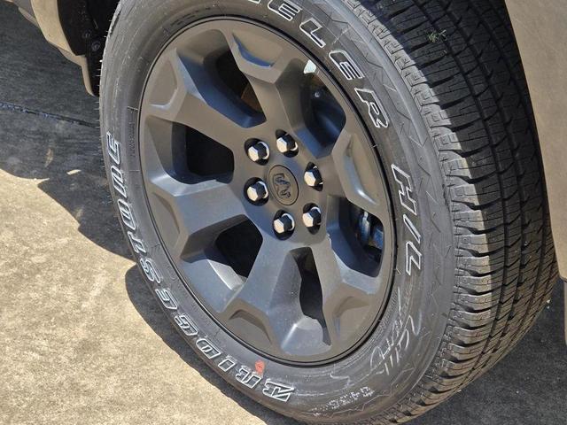 Photo of 2025 Granite Crystal Clearcoat Metallic RAM 1500