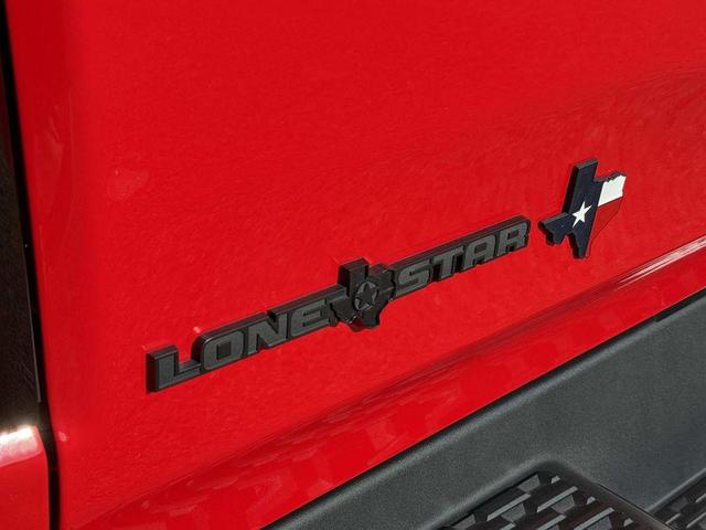 Photo of 2025 Flame Red Clearcoat RAM 1500