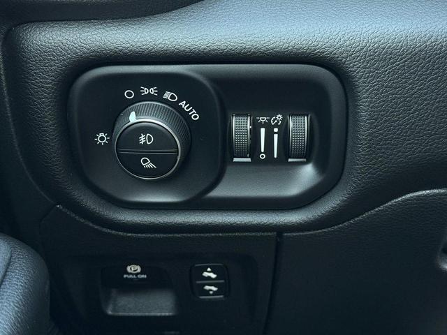 Photo of 2025 Flame Red Clearcoat RAM 1500