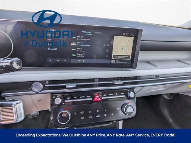 Photo of 2025 Titan Gray Hyundai TUCSON Hybrid