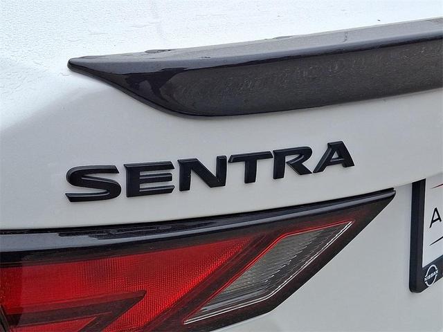 Photo of 2025 Aspen White Tricoat/Super Black Nissan Sentra