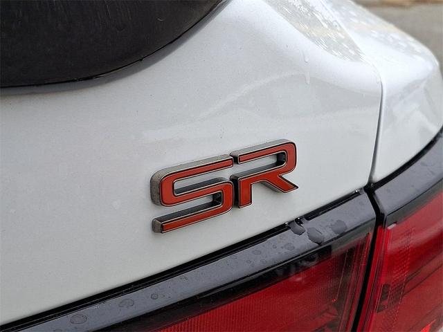 Photo of 2025 Aspen White Tricoat/Super Black Nissan Sentra